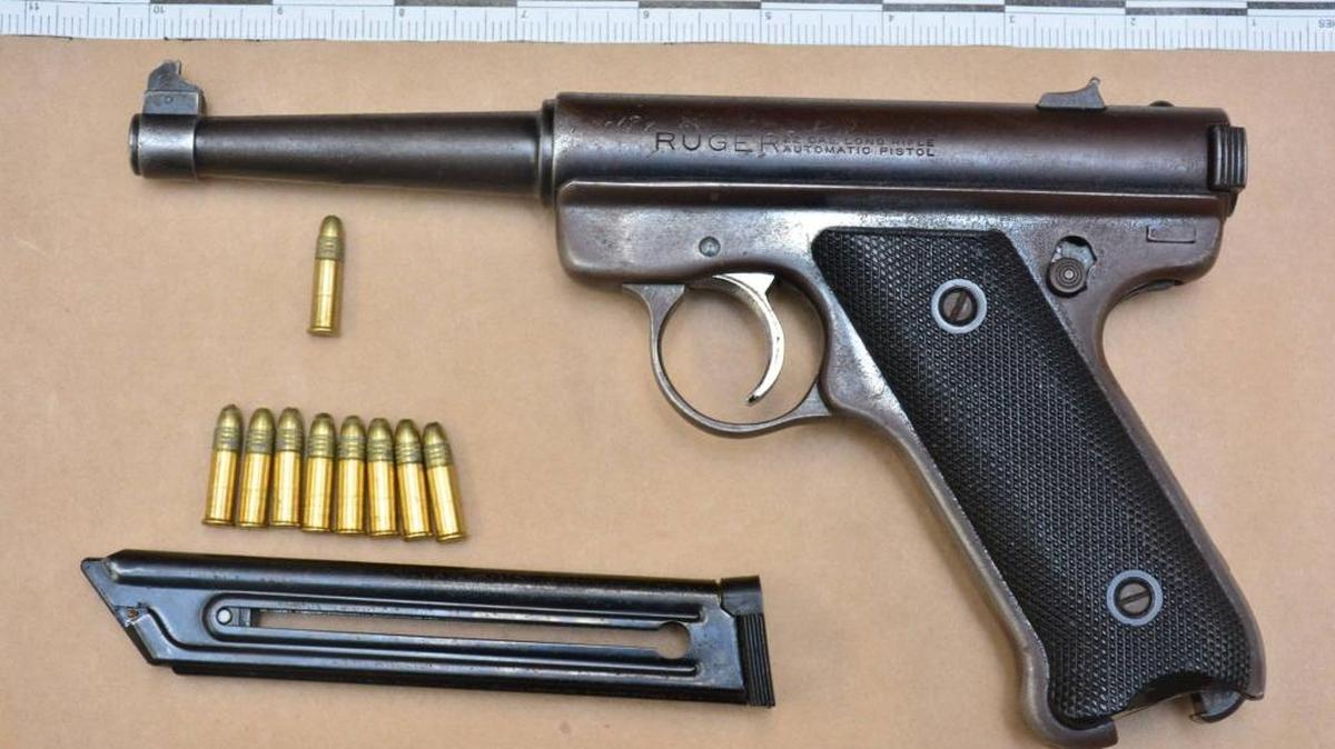 Police say a Ruger .22 caliber pistol was tossed by the running suspect. Officers backtracked and recovered it.