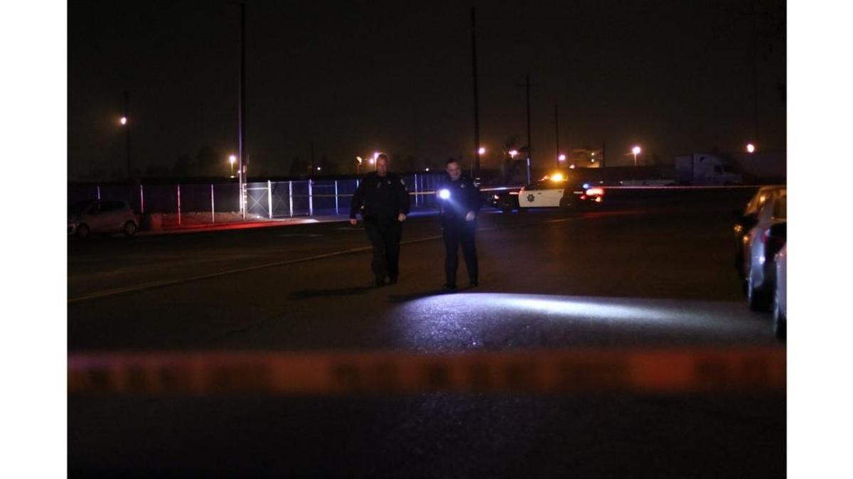 Police investigate shooting scene late Wednesday night after a bicyclist was critically wounded by a motorist west of Highway 99 at Shields and Marks avenues.