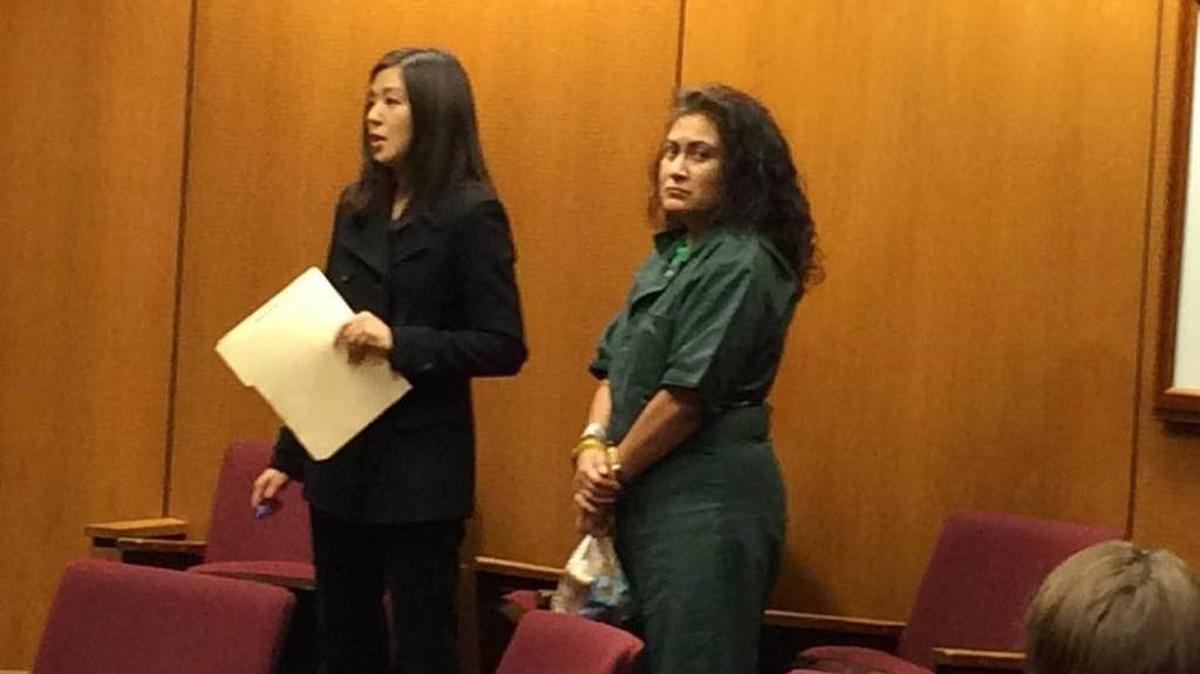 Sylvia Castro Garcia, right, stands next to her attorney, Emily Takao, in a Fresno courtroom, where she pleaded no contest in November to conspiring with her brother to dissuade a witness from testifying in his pending murder trial. On Wednesday, March 29, 2017, Garcia was sentenced to two years in prison.