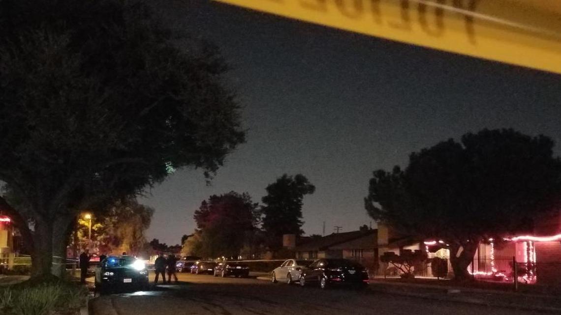 Fresno police investigate a reported homicide Tuesday near Shields Avenue and Anna Street in central Fresno.