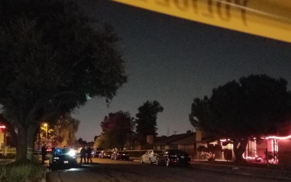 Fresno police investigate a reported homicide Tuesday near Shields Avenue and Anna Street in central Fresno.