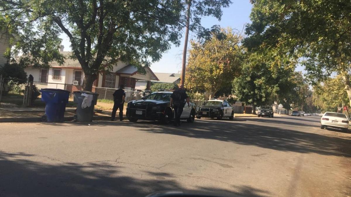 Fresno police officers at a shooting scene in central Fresno.