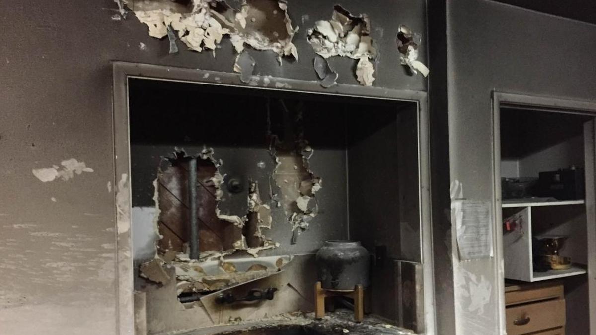 The charred interior of the storage room for wine and vestments at Immaculate Heart of Mary Catholic Church.