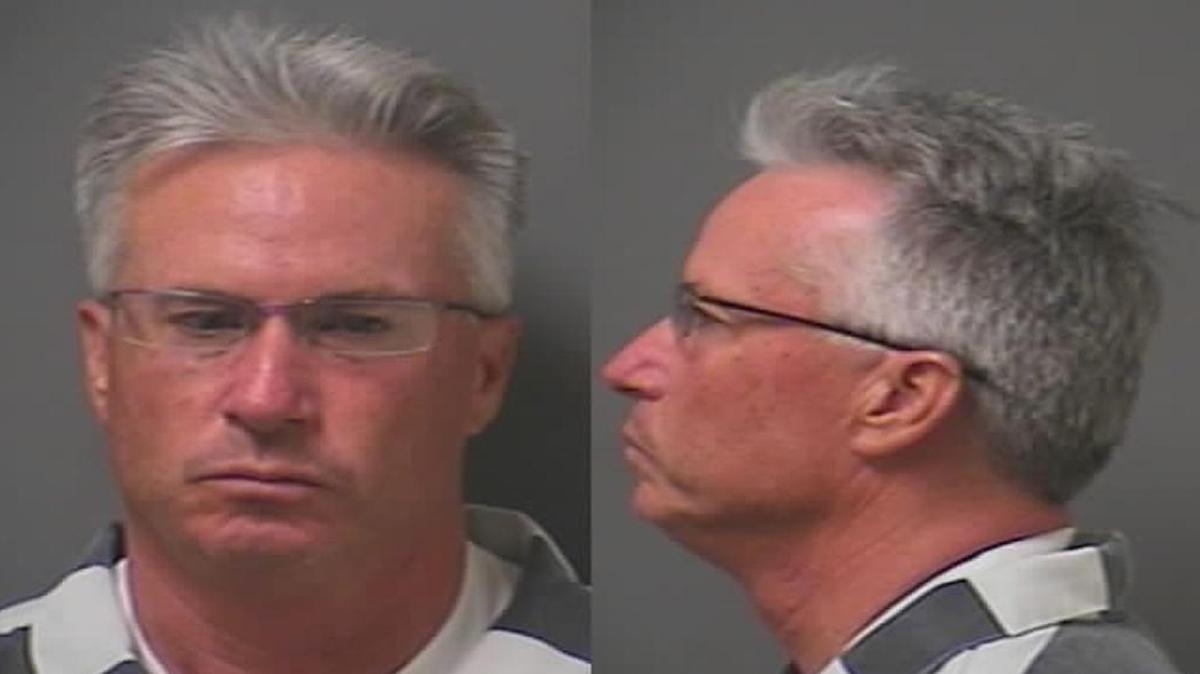 Todd Pate as shown in his booking mug from 2013. He is now on trial for allegedly killing his wife.