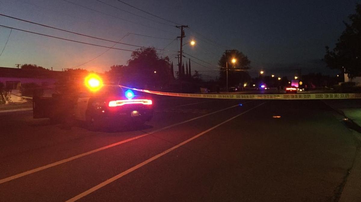 The scene of a fatal shooting in northeast Fresno is taped off Thursday evening.