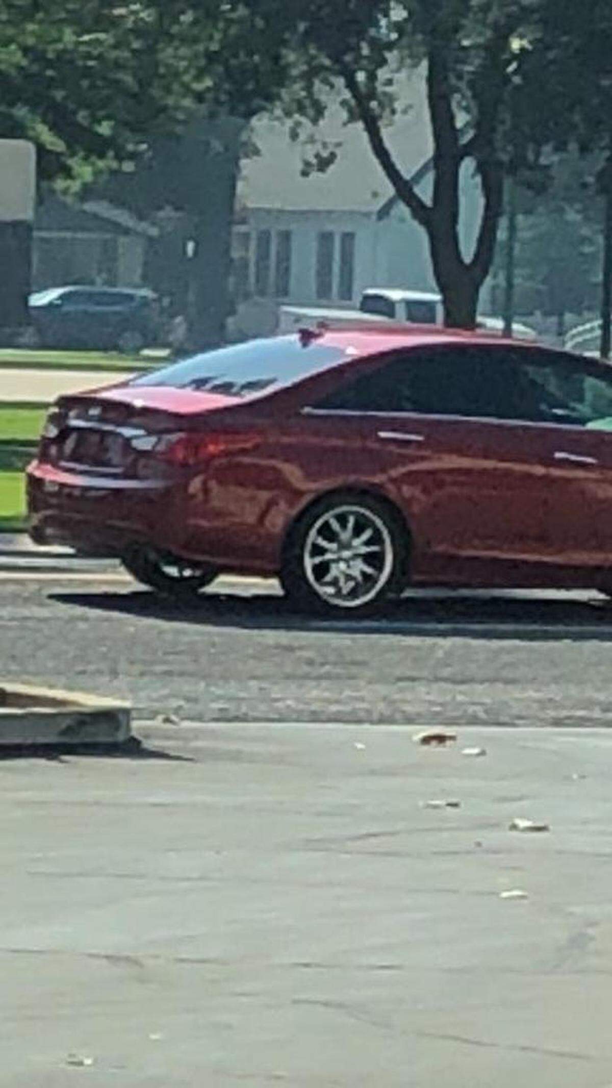 Police say the suspect in a Tulare bank robbery left in this maroon Hyundai Sonata.