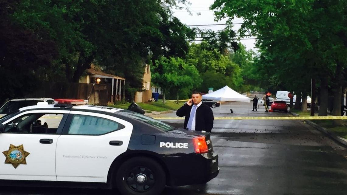 Fresno police investigate the scene of an officer-involved shooting in the Fresno High area early Sunday morning, April 10, 2016.