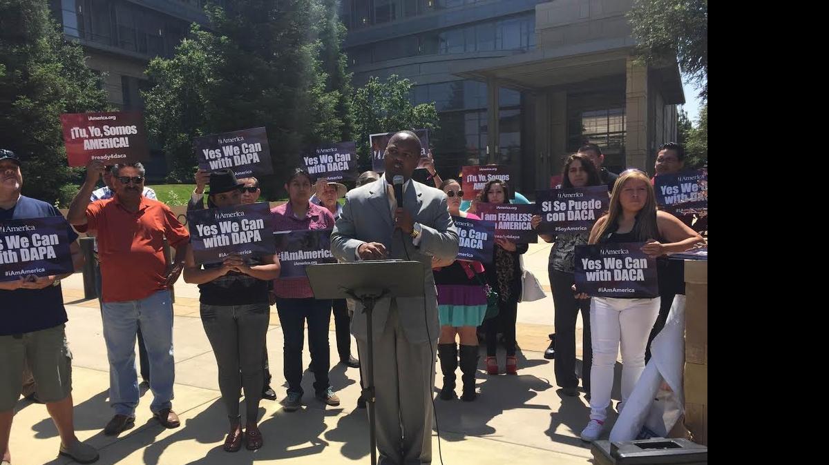 
Fresno Council Member Oliver Baines speaks at a rally Tuesday to support President Obama’s plans for immigration reform. The gathering was held at the federal courthouse downtown.
