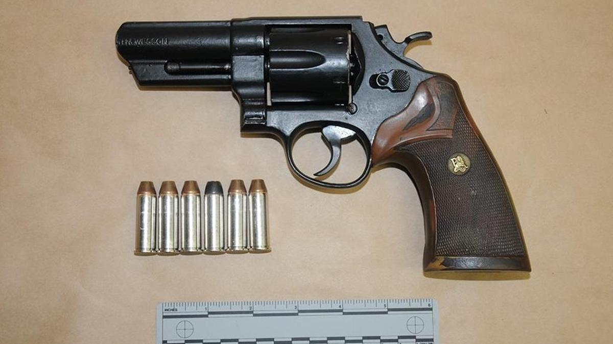 Police say this loaded .44 Magnum pistol with the barrel partially sawed off was recovered Sunday, Jan. 17, 2016.