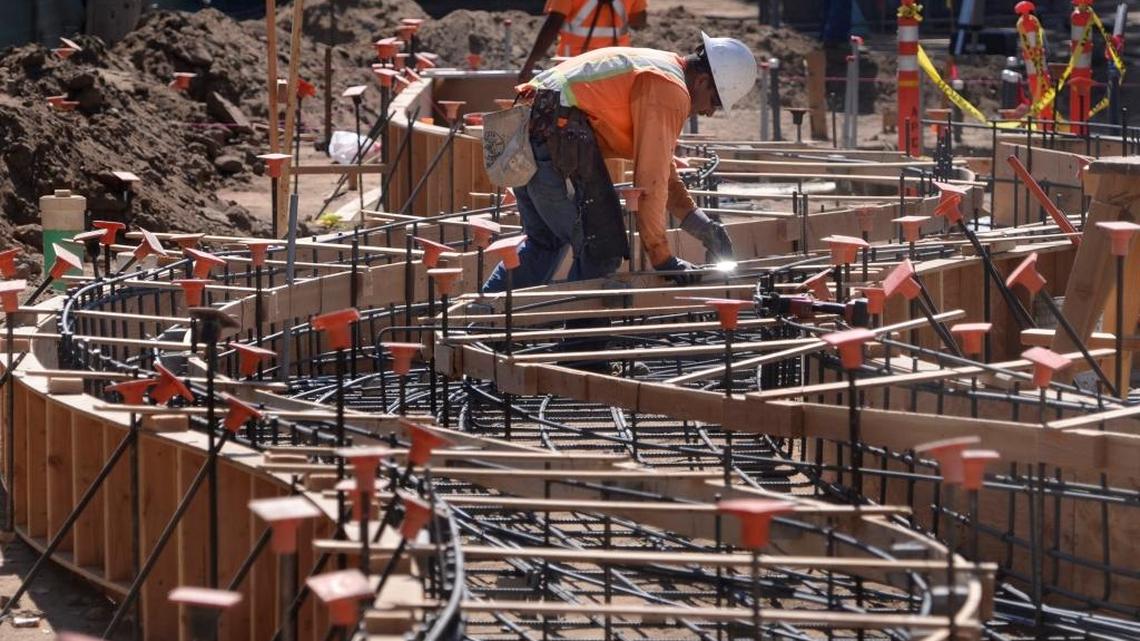 Workers set forms for the winding maze of what will be a concrete waterway feature on the new Fulton Street, near Tuolumne Street in this September 2016 photo. New community plans being considered Thursday by the Fresno City Council would establish development guidelines and zoning regulations for the Fulton Street corridor and neighboring downtown areas.