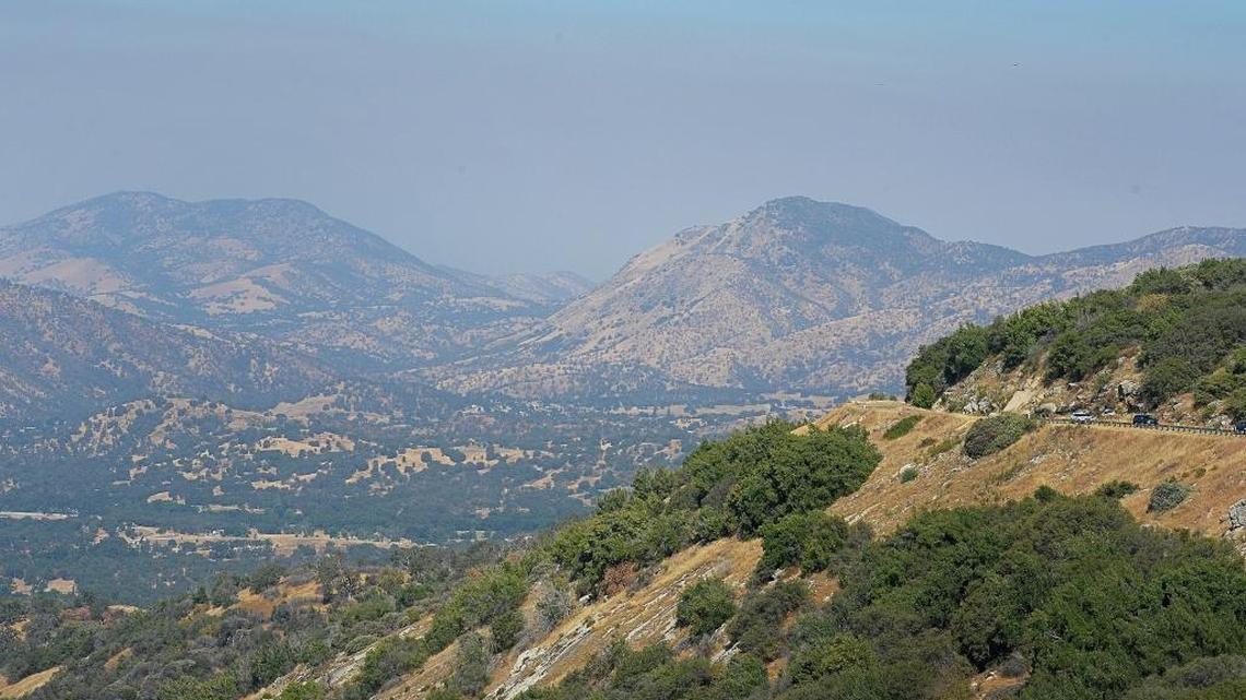 A smoky cloud hangs in the air above the Dunlap area in eastern Fresno County off of Highway 180 after days of wildfire has been burning near Mariposa and spreading smoke around the state, on Thursday, July 20, 2017.