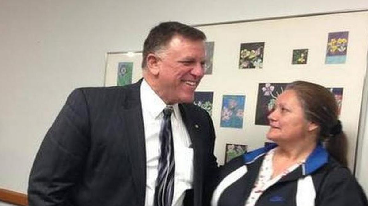 
Mark Sutton receives a hug from a supporter at the Selma Unified school board meeting in February where Sutton was voted out as district superintendent.
