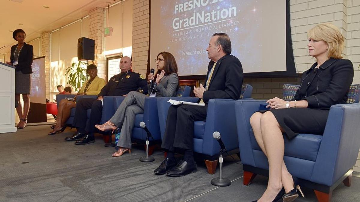 Brittany Moore, left, manager of Alliance Engagement, introduces panel members, from left, Fresno County Deputy District Attorney Jennifer Smith, Fresno Police Chief Jerry Dyer, First 5 Fresno County Director Emilia Reyes, Fresno County Superintendent of Schools Jim Yovino and Fresno Mayor Ashley Swearengin, during the Fresno 2015 GradNation community summit at Fresno State on Tuesday, Oct. 20, 2015.