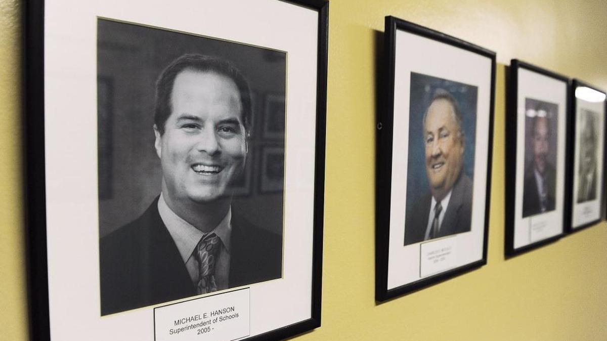Former Fresno Unified superintendent Michael Hanson's portrait is seen in the hallway at FUSD headquarters in a row of photos of all of the district’s past leaders. The school board will vote to hire his replacement before the new school year begins, school board President Brooke Ashjian said.