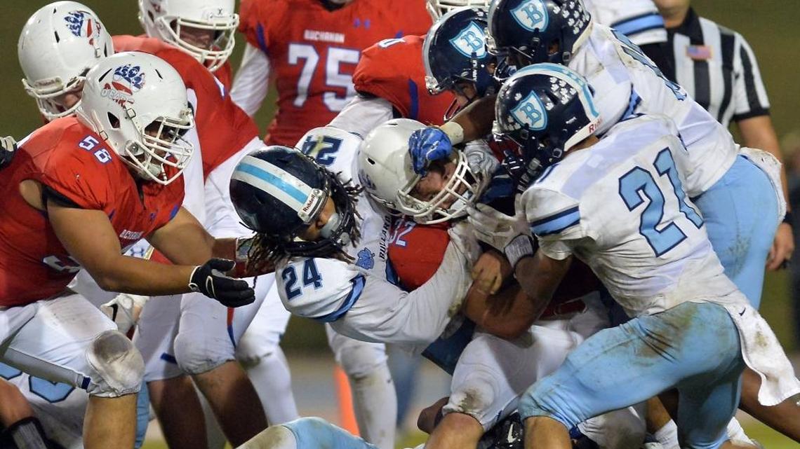 The Bullard High Knights, in white, meet Buchanan High in a game last year. Fresno Unified says that if its teachers decide to walk out, school activities such as sports and club meetings will be suspended – meaning no football games for FUSD teams.