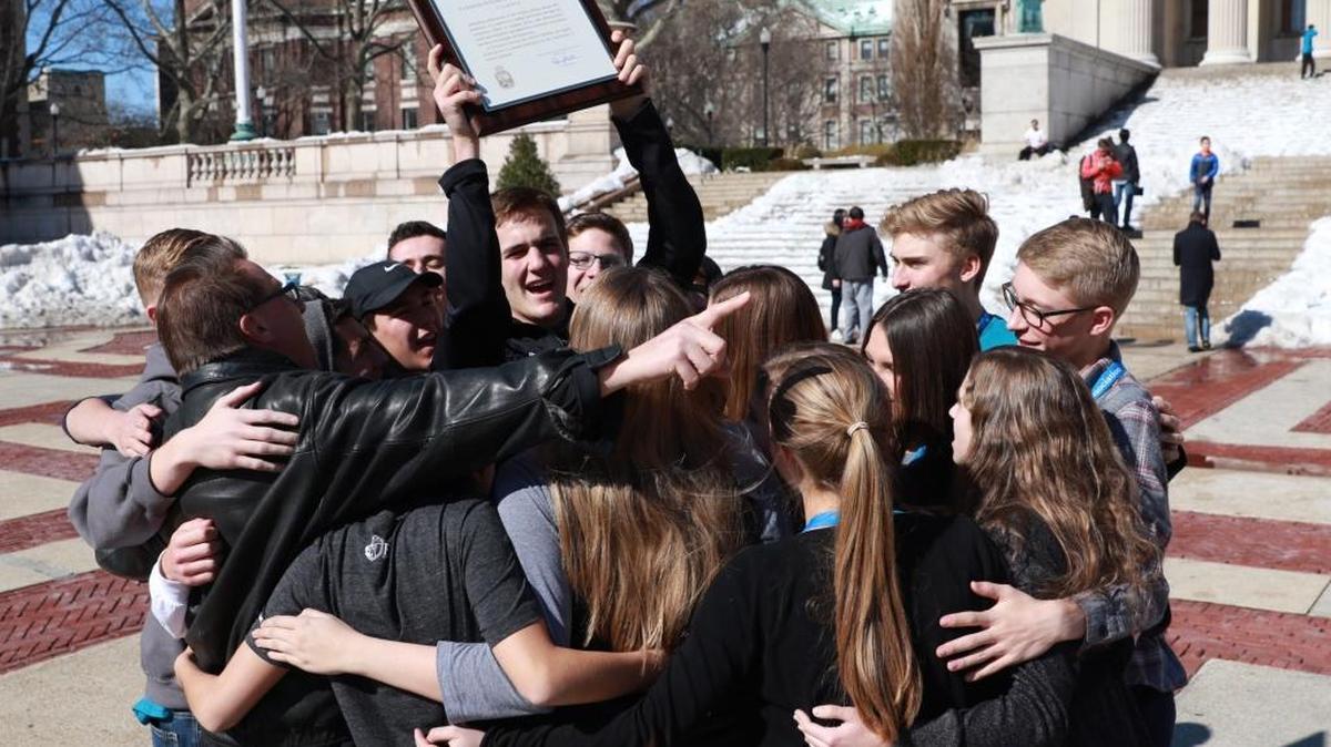 Fresno Christian High School’s student-run daily digital newspaper staff celebrates its Columbia Scholastic Press Association Gold Digital News Crown on Friday, March 17 in New York.
