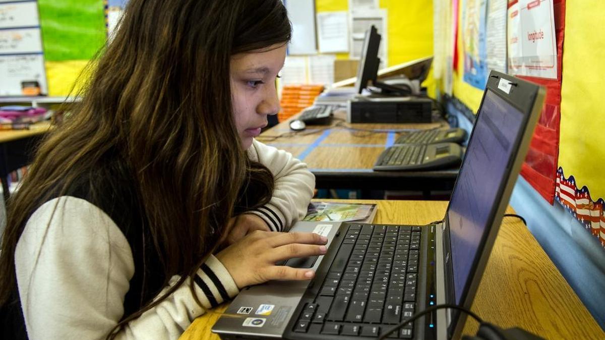 Tracy elementary school student Gabrialla Urquidez, 11, takes a reading test. The Smarter Balanced assessment, the state’s new standardized test, is taken on computers and adapts to students’ strengths and weaknesses.