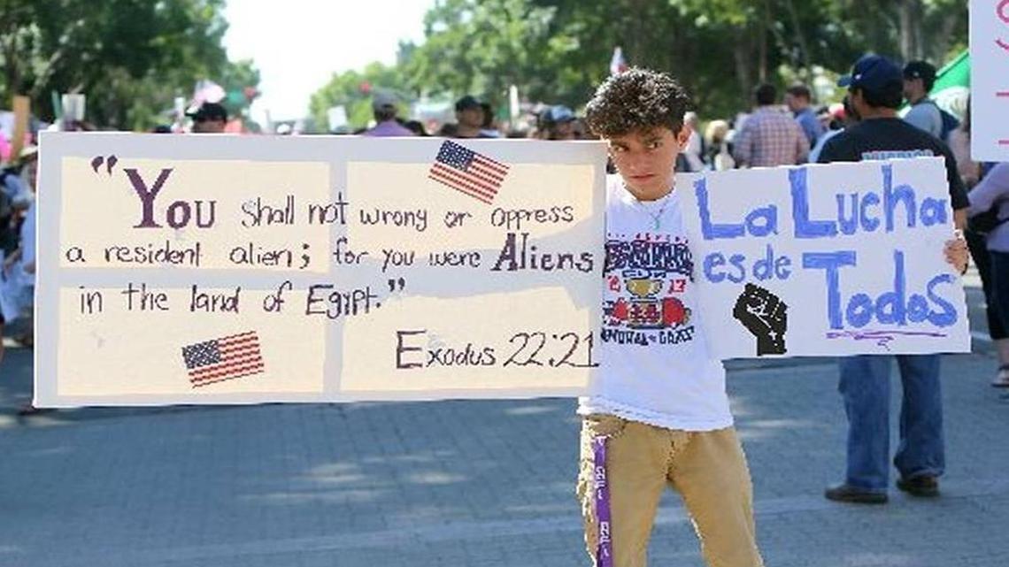 San Joaquín Memorial High student Daniel Prieto protests at a Donald Trump rally at Fresno’s Selland Arena in May.
