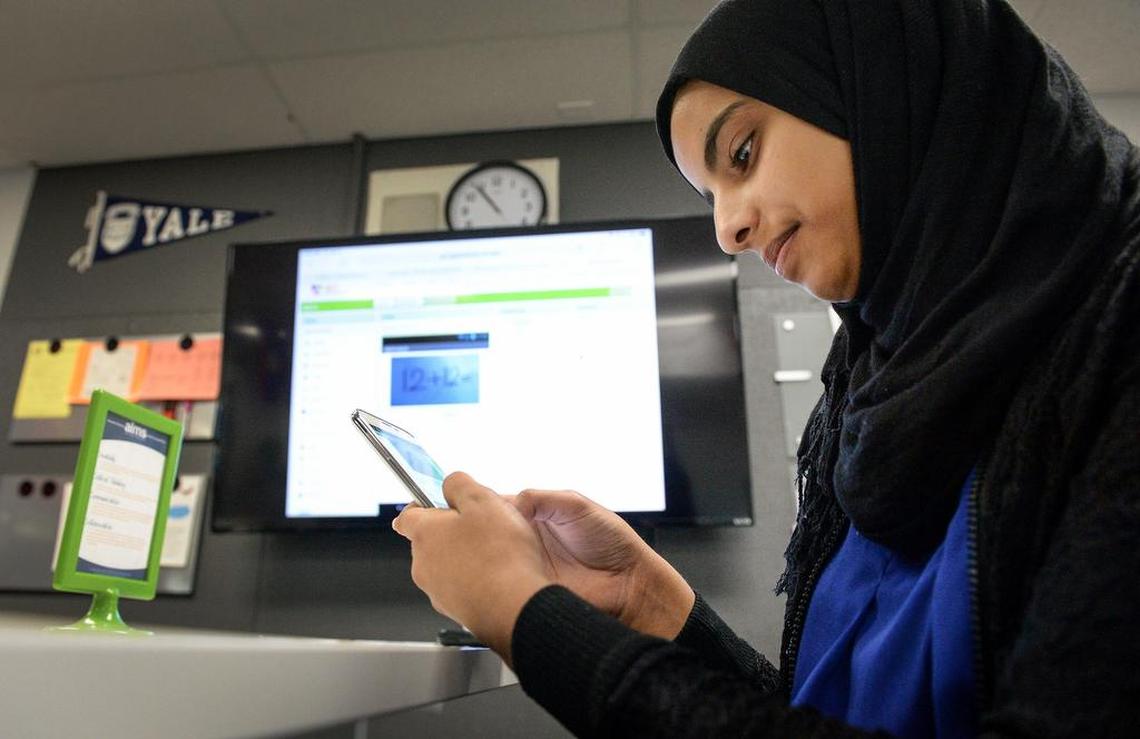 Amal Qasem, 15, an eighth-grader in Efraín Tovar’s newcomers class, shows how a math app she created works on a projection screen at Abraham Lincoln Middle School in Selma on Friday, Jan. 11, 2019.