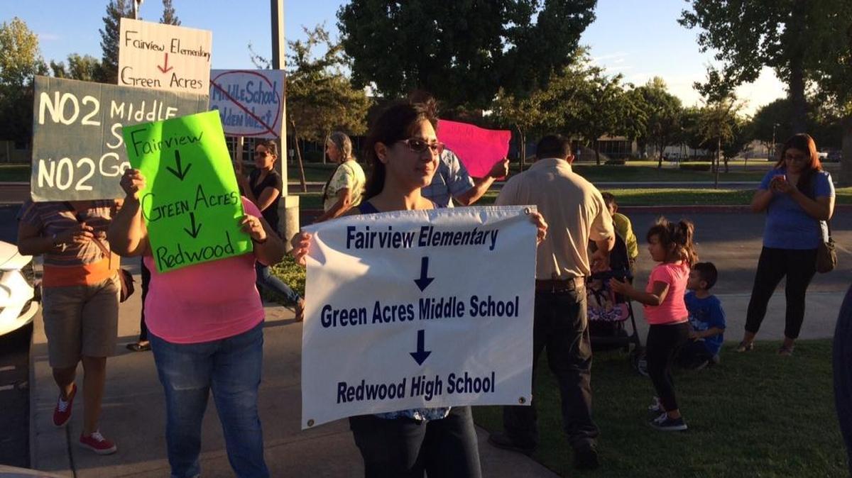 
Several Fairview Elementary School parents protest new middle and high school boundaries in Visalia on Tuesday night.
