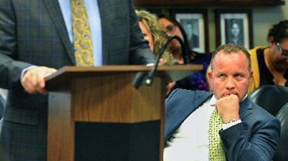 Fresno Unified Superintendent Michael Hanson, standing, and school board member Brooke Ashjian went head-to-head over the needs of Measure X at a Chamber of Commerce meeting in September.