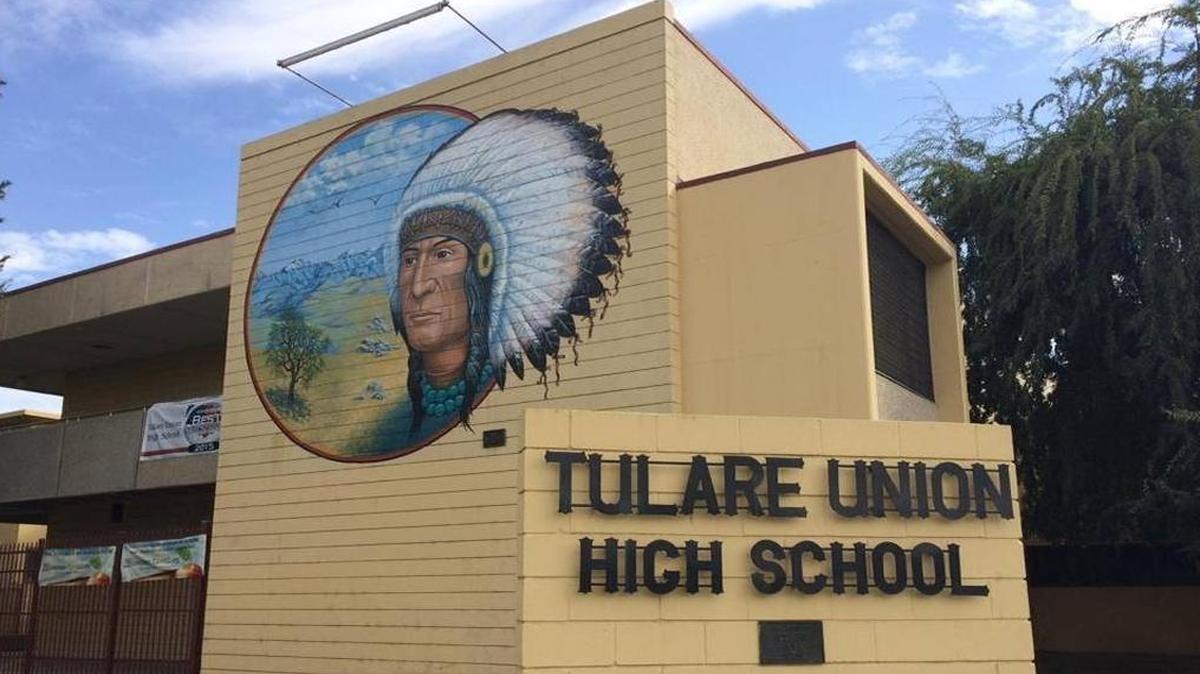 Tulare Union High prominently displays a mural of an American Indianat the front of the school.