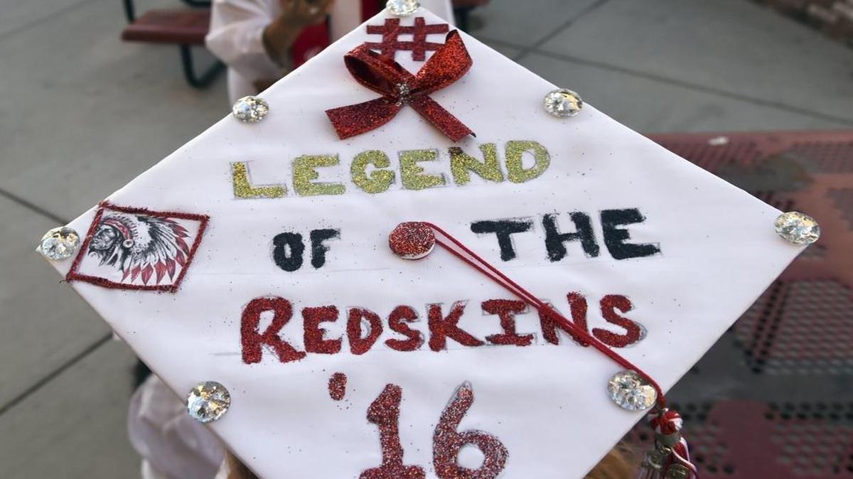Graduates prepare for the start of Chowchilla High’s graduation ceremony held at Henry Massaro Stadium Friday night, June 3, 2016 in Chowchilla, Calif. Two hundred eleven students graduated Friday night, the last class graduating as the Redskins.