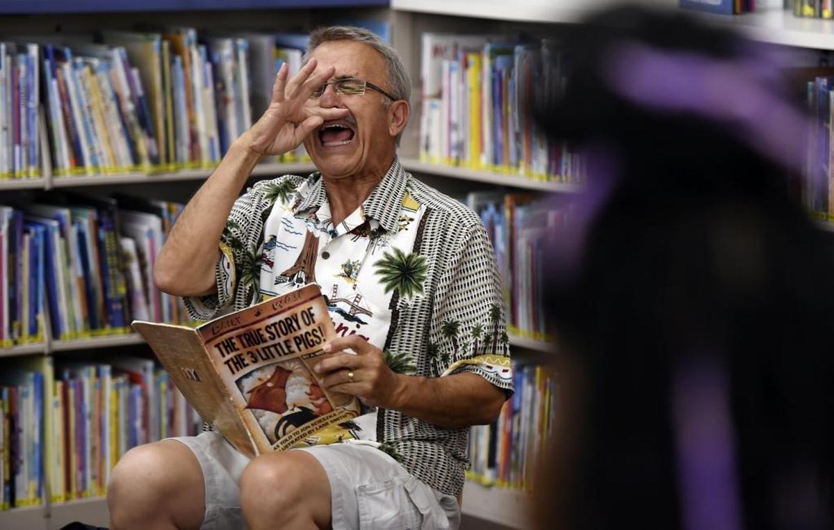 Kopi Sotiropulos acts out part of “The True Story of the 3 Little Pigs.”