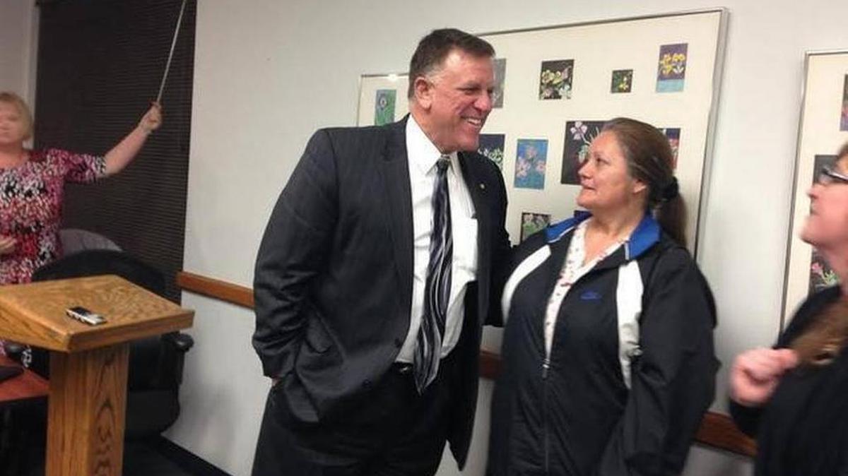 
Mark Sutton receives a hug from a supporter at the Selma Unified school board meeting in February where Sutton was voted out as district superintendent.

