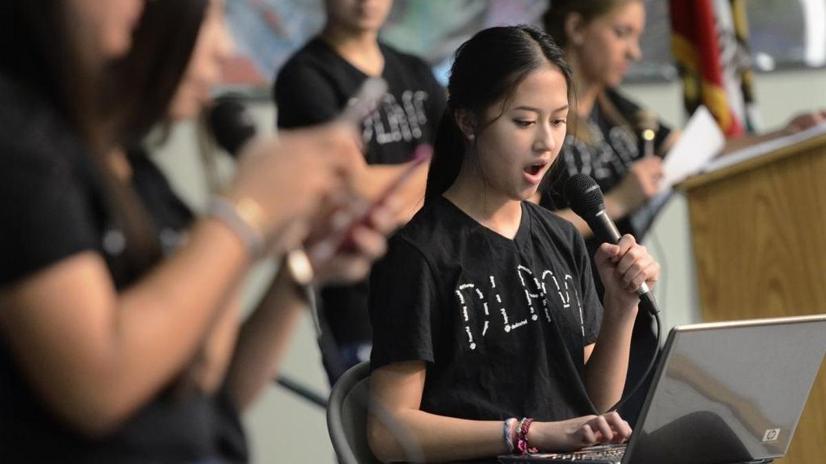 Sunnyside High School student Angelica Flores reacts to being cyber-bullied in a skit presented to Greenberg Elementary School students on Friday, Jan. 15, 2016.