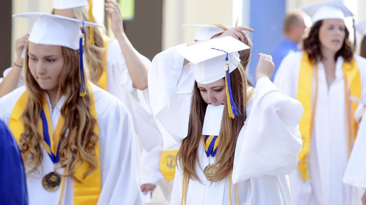 Graduating seniors get ready to begin their commencement ceremony at Clovis High School, Wednesday.