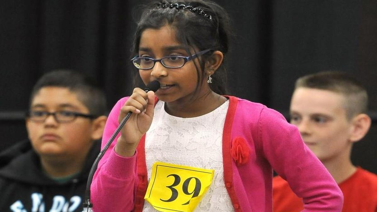 Ananya Vinay, Fugman Elementary fourth grader in Clovis Unified, spells the word battalion correctly for first place in the 21st annual Fresno County Spell-Off competition in 2015.