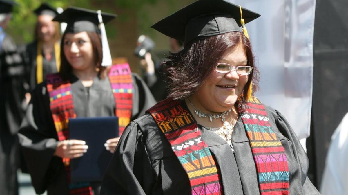 Fresno Pacific University announced plans to end its tradition of allowing minority students to wear ethnic sashes, such as these from the unversity’s 2009 graduation ceremony. Some students are urging that the tradition be restored.
