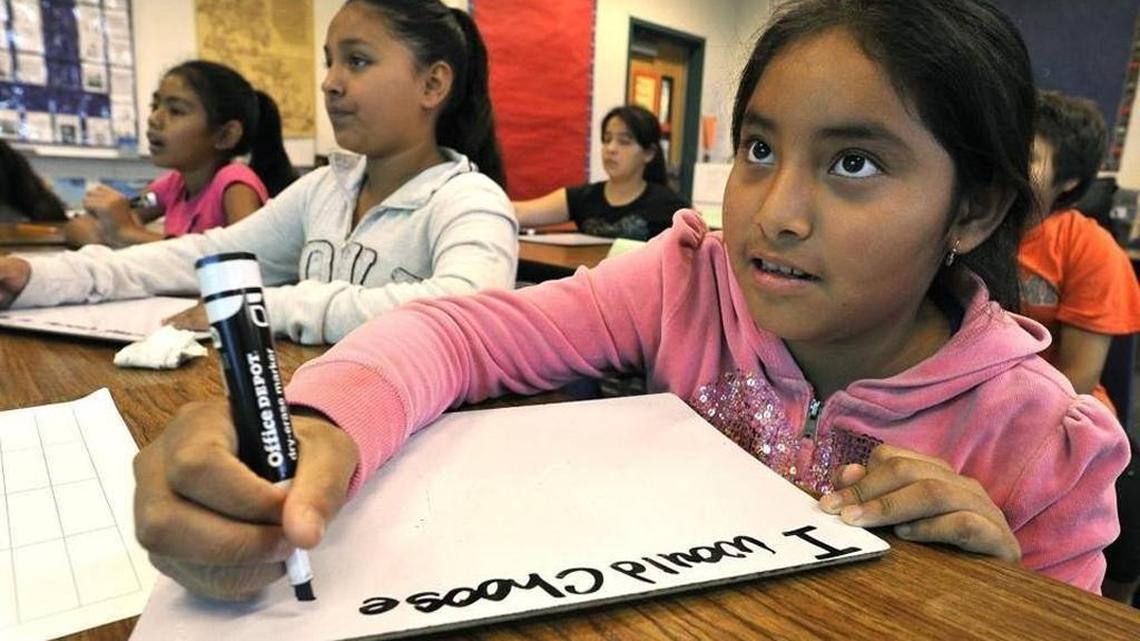 Fresno Unified student Marissa Angeles attends an English learner class at Yokomi Elementary in 2015. The district announced Friday it will expand its dual immersion programs, which start off by teaching nearly entirely in Spanish in order to produce bilingual students.