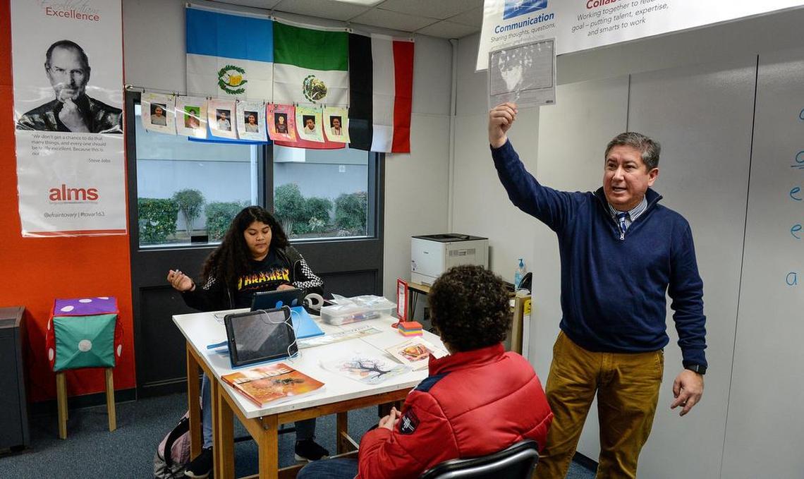 Newcomers class teacher Efraín Tovar gives out English lesson instructions during class at Abraham Lincoln Middle School in Selma on Friday, Jan. 11, 2019.