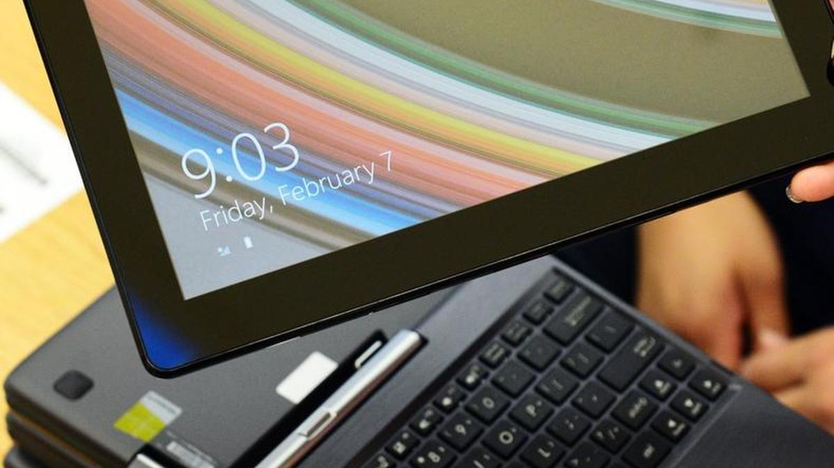 An ASUS tablet with detachable keyboard is checked in at Leavenworth Elementary School in Fresno where students will be outfitted with the tablets as they get ready for Common Core state testing this spring.