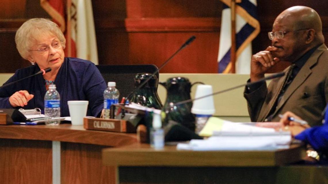 Fresno Unified School District Trustee Janet Ryan, left, directs a comment toward trustee Cal Johnson during a board meeting in 2011.