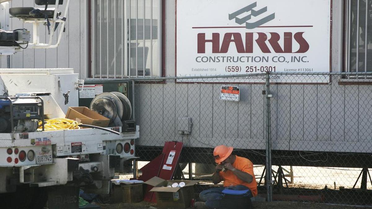 
A Harris Construction sign is shown outside the construction office where Fresno Unified's new Gaston Middle School was being built in west Fresno in 2012. The school opened in August 2014.
