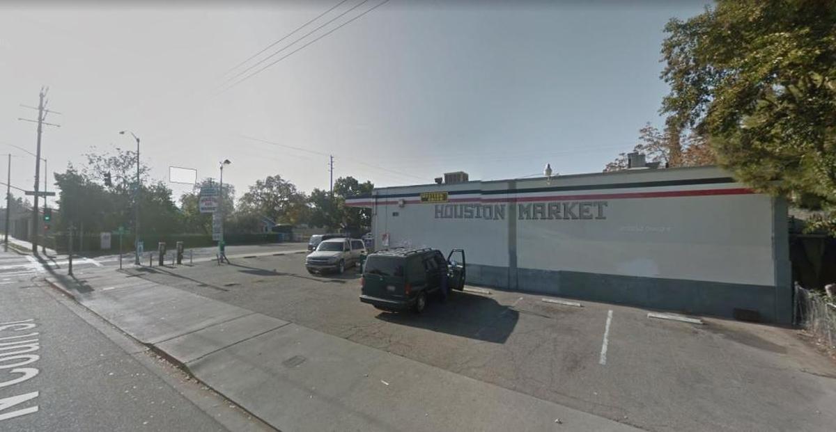 The Houston Avenue Market in Visalia was threatened, but remains open, after a nearby house caught fire on Friday, Dec. 30, 2017.