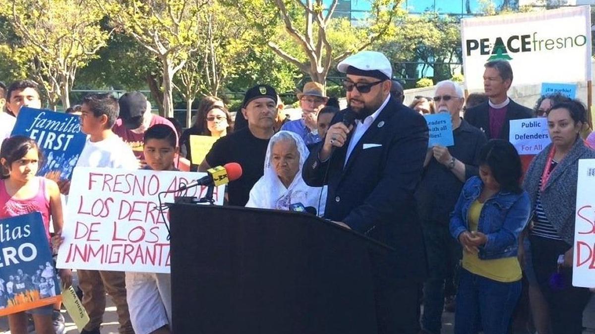 Reza Nekumanesh of Fresno’s Islamic Cultural Center speaks Wednesday, June 14 at a rally outside Fresno City Hall to advocate for a legal defense fund to help undocumented immigrants facing possible deportation.