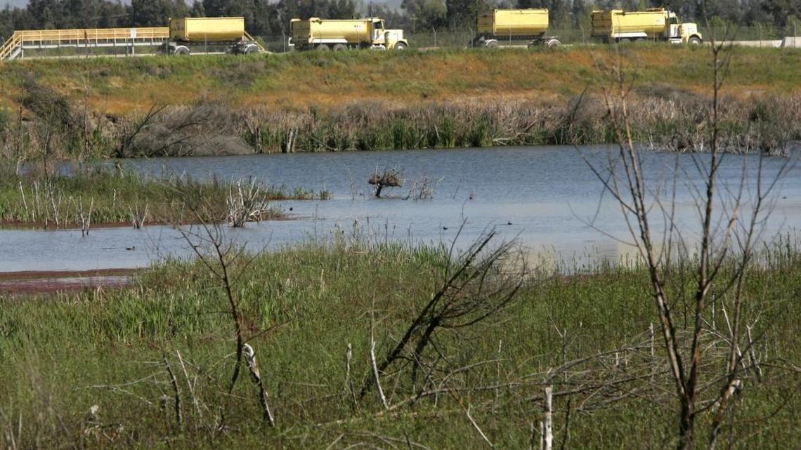 A line of gravel trucks leave the Vulcan gravel plant at Gibson Ranch on the San Joaquin River in 2009. Vulcan is now poised to open a quarry to the north, near the intersection of highways 41 and 145. The Madera County Planning Commission is expected to consider approval of the project at its July 19 meeting.
