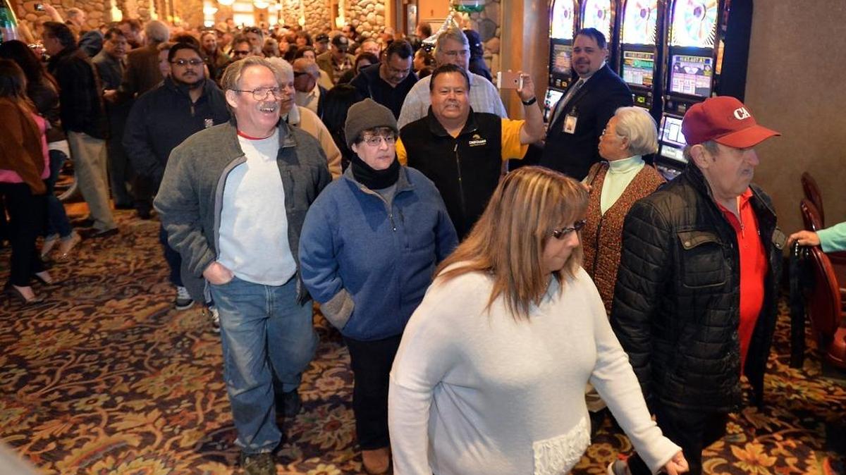 Visitors rush past the entrance as they enter Chukchansi Gold Resort & Casino two weeks ago.