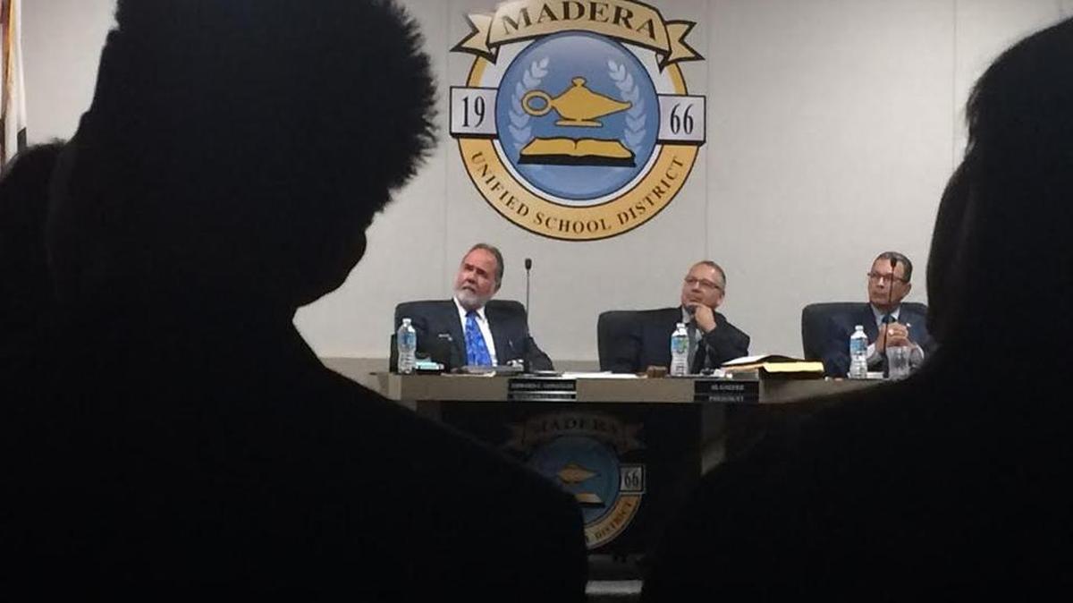 Madera Unified Superintendent Ed Gonzalez, left, hears reports at the school board meeting last week, where accusations arose about sex crimes involving a Madera South High teacher. The teacher has been placed on leave.