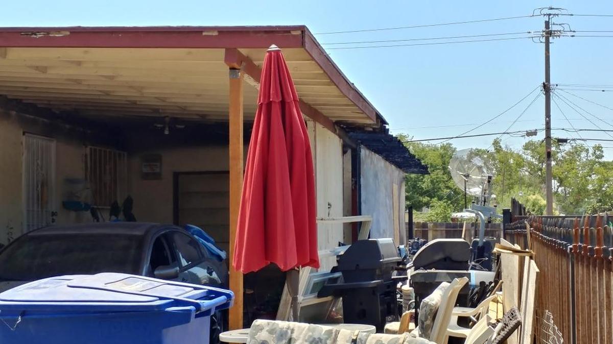 A Fresno police officer was the first to see smoke and flames coming from a southwest Fresno home around 3 a.m. July 4. He got the residents out, along with residents of a home next door. The fire was contained mainly to the home’s garage.
