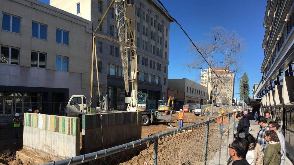 The mosaic benches and the Dancing Waters fountain on Fulton Mall were moved to new spots on the street.