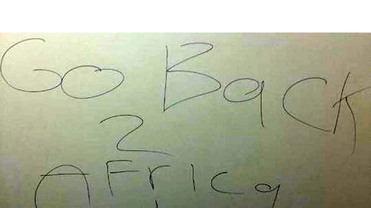 Clovis High School administrators are searching for the student who wrote racial slurs on bathroom stalls last week.