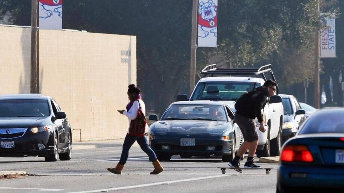 The intersection at Cedar Avenue and Bulldog Lane got a new left-turn signal to benefit the large student and sports-fan pedestrian traffic. This picture was taken before the signal was added. On Wednesday, Nov. 1, 2017, a jury rejected a lawsuit that claimed the intersection was dangerous and caused motorcyclist Steven Kennedy to collide with a car and get badly injured in April 2014.