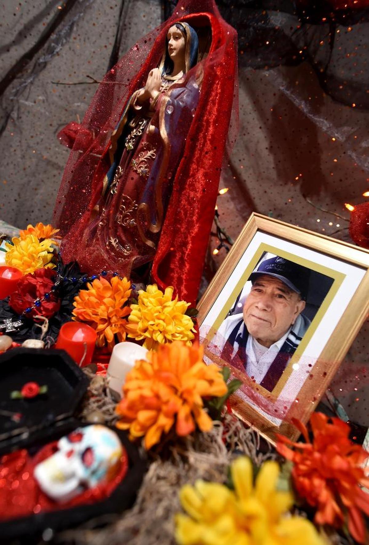 “Day of the Dead” altars often include photos of those who have died.