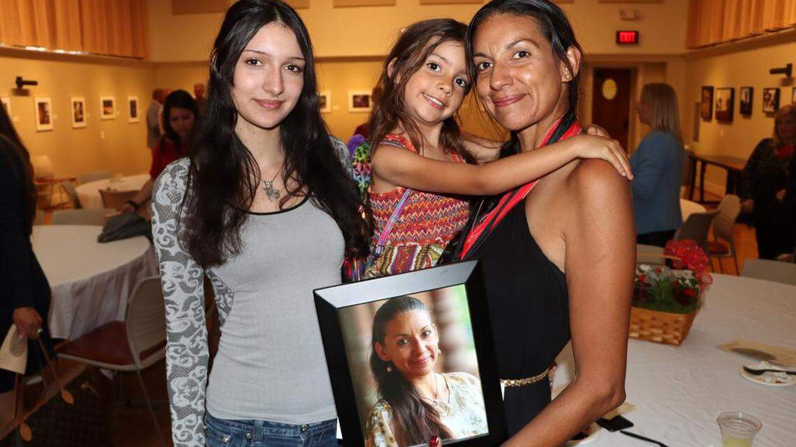 Angela Ray Grantham – with daughters Clarrisa Burrill, 18, and Natalie Grantham, 5 – graduates as the Tony Cantú President’s Medallion from Fresno City College on Friday, May 19.