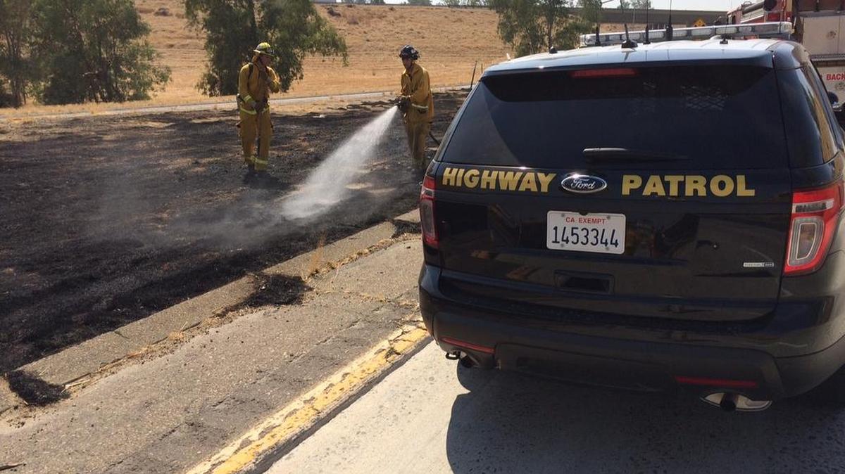 
This California Highway Patrol vehicle sparked a grass fire west of Visalia Tuesday when it stopped to check on a minor accident. The fire was quickly extinguished. 
